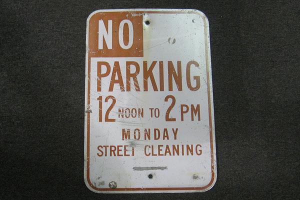 Sign-No parking 12:00 noon to 2:00 PM Monday Street Cleaning, stock number S-0139m