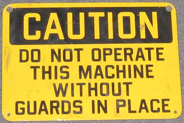 Sign-Caution do not operate this machine without guards in place, stock number S-0170