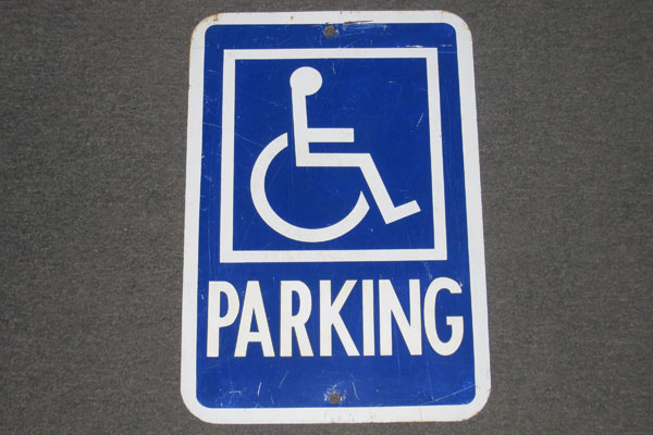 Sign-PARKING w/ symbol of disabled person, stock number S-0516
