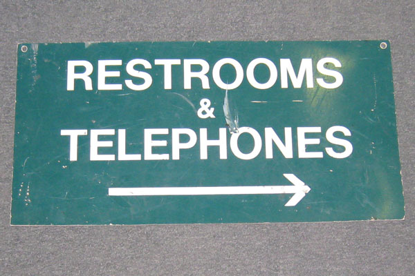 Sign-Restrooms & Telephones <----, stock number S-0579