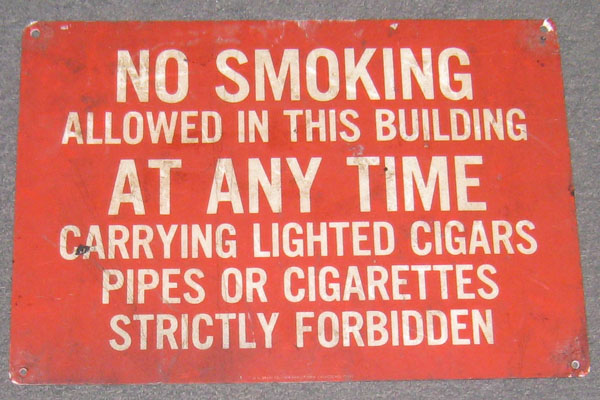 Sign-No Smoking Allowed In This Building At Any Time Carrying Lighted Cigars, stock number S-0848