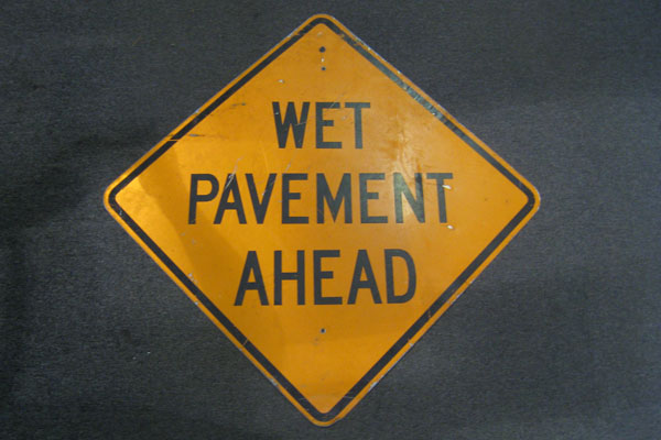 Sign-Wet Pavement Ahead, stock number S-1062