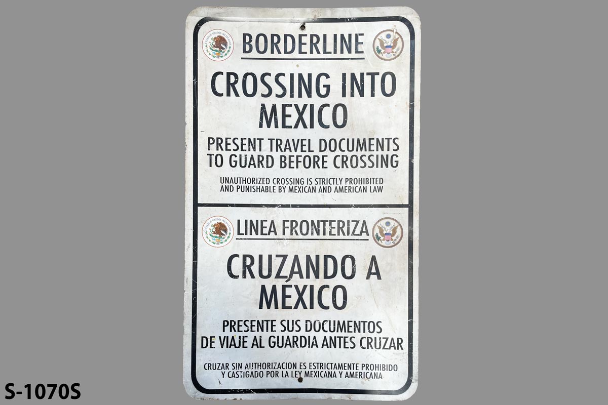 Sign-English/Spanish-Borderline Crossing Into Mexico...Linea Fronteriza, stock number S-1070s