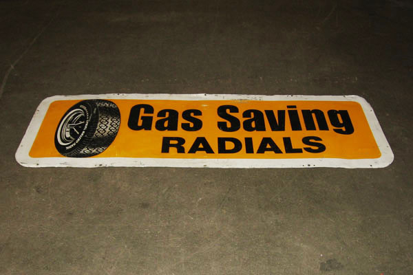 Sign-Gas Saving Radials w/ picture of tire on wheel, stock number S-1073