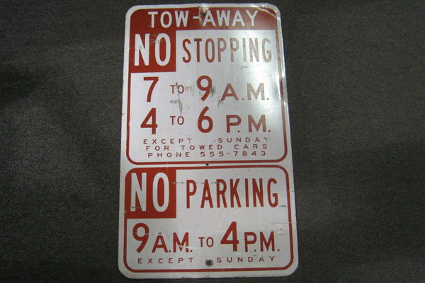 Sign-Tow-away No Stopping 7 to 9AM 2 to 6PM Except Sunday No Parking 9AM to 4PM, stock number S-1254