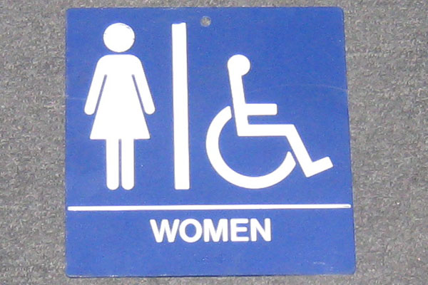 Sign-Restroom - F symbol w/ wheelchair - blue plastic - 8" square, stock number S-1983