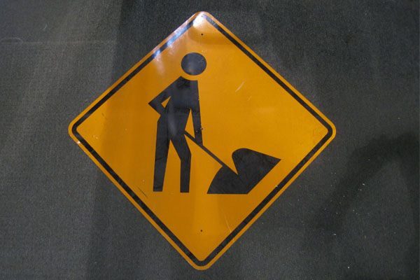 Sign-Symbol of Man Working, stock number S-2086