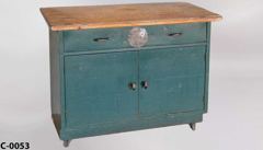 Cabinet, dark green metal, w/ wood top, 2 door/1 drawer, casters, stock number C-0053