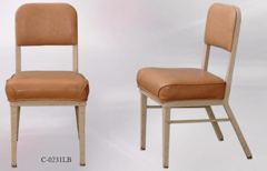 Chair, metal frame, light brown vinyl seat/back, stock number C-0231lb