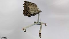 Engine, automobile, 6 cylinder, on orange stand, A-shaped base, w, stock number E-0362