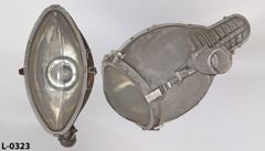 Light, flood, exterior, oval "eye" shape glass lens, deco cover, 12"w, stock number L-0323