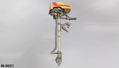Outboard boat motor, small, beige/orange, TAS, no propeller, 8"w x, stock number M-0031