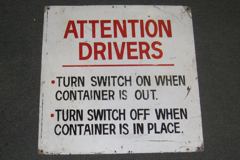 Sign-Attention drivers turn switch on when container is out... metal, stock number S-0114