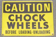 Sign-Caution - Chock Wheels Before Loading - unloading, plastic, stock number S-0118