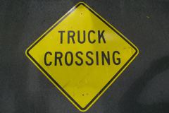 Sign-Truck Crossing, metal, yellow/black, 41"w x 41"t (30"x30" square), stock number S-0271