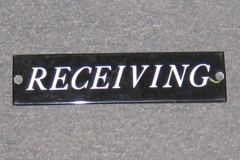 Sign-Receiving, black/white, metal, 10"w x 2"t, stock number S-0273