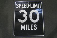 Sign-Speed Limit 30, w/ reflectors in 30, metal, white on black, 24"w, stock number S-0289