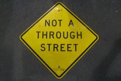 Sign-Not A Through Street, metal, black/yellow, 24x24, stock number S-0324
