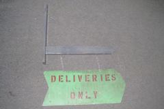 Sign-Deliveries Only (hanging on wood bracket), metal, red/green, stock number S-0455