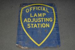 Sign-Official Lamp Adjusting Station, metal, period, gold/dark blue, stock number S-0460