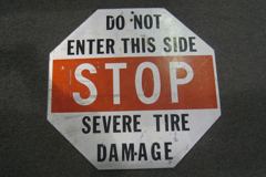 Sign-Do Not Enter This Side Stop Severe Tire Damage, octagon shape, stock number S-0500