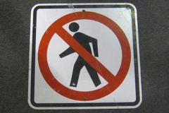 Sign-international symbol for no crossing, 18x18, stock number S-0506