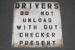Sign-Drivers Do Not Unload Without Checker Present, metal, blk/wht, stock number S-0760