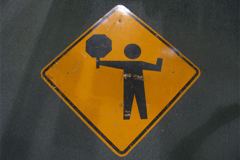 Sign-Symbol For Flagman, metal, black/orange, 49"w x 49"t (36"x36", stock number S-0946