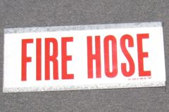 Sign-Fire Hose, 2 sided-wall mount,metal, red/wht, 14"w x 6"t, stock number S-1002