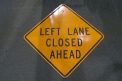 Sign-Left Lane Closed Ahead, metal, black/orange, 49"w x 49"t, stock number S-1061
