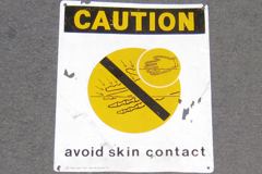 Sign-Caution Avoid Skin Contact, blk/ylw/wht metal, 10"w x 12"t, stock number S-1100
