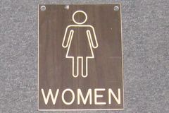Sign-Women - w/ outline of female figure, stock number S-1104