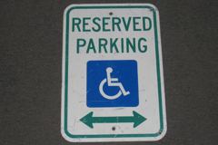 Sign-Reserved Parking, w/ symbol for disabled person in wheelchair, stock number S-1173