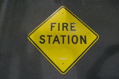 Sign-Fire Station, metal, blk/ylw, 30 x 30, stock number S-1180