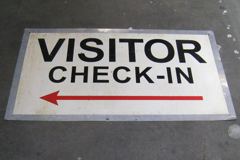 Sign-Visitor Check-In, metal, blk/red/wht, 48"w x 261/2"t, stock number S-1265