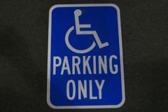 Sign-(handicapped symbol) PARKING ONLY, wht/blue, metal, 12"w x 18"t, stock number S-1269