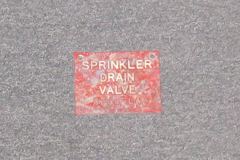 Sign-Sprinkler Drain Valve, red/wht, 4" w x 3"t, stock number S-1310