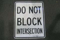 Sign-Do Not Block Intersection, blk/wht 30"x23", stock number S-1440