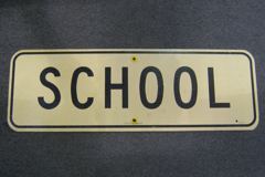 Sign-School Sign, yellow/blk, metal, 36"w x 12"t, stock number S-1467