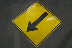 Sign-Arrow, yellow/ blk 2'x2', stock number S-1470