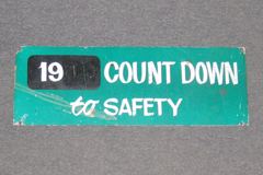 Sign-19__ Count Down To Safety, green/wht/blk (2 sided), metal, 20"w, stock number S-1496