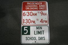 Sign-Passenger loading & unloading only 6:30am to 9am/ 1:30pm to 4pm, stock number S-1636
