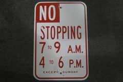 Sign-No stopping 7 to 9am/ 4 to 6pm except Sunday, red/wht metal 12x18, stock number S-1648
