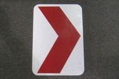 Sign-> chevron, red & white, metal, 12"w x 18"t, stock number S-1665