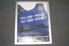 Poster, NYPD, 18"w x 24"t, metal frame "This can't protect you from, stock number S-1837m