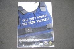 Poster, NYPD , 18"w x 24"t, plastic frame "This can't protect you, stock number S-1837p