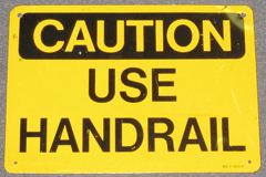 Sign-Caution, Use Handrail, black/yellow, metal, 14"w x 10"t, stock number S-1866