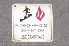 Sign-In Case of Fire Do Not Use Elevators, plastic, 7" x 7", stock number S-1891