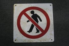 Sign-international symbol for no crossing, 12x12, plastic, wht/red/blk, stock number S-1905