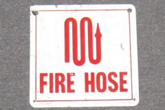 Sign-Fire Hose, red/white, plastic, 8"w x 8"t, stock number S-1945